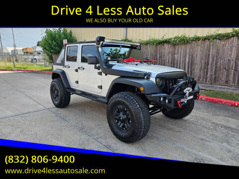 2010 Jeep Wrangler Unlimited for sale at Drive 4 Less Auto Sales in Houston TX