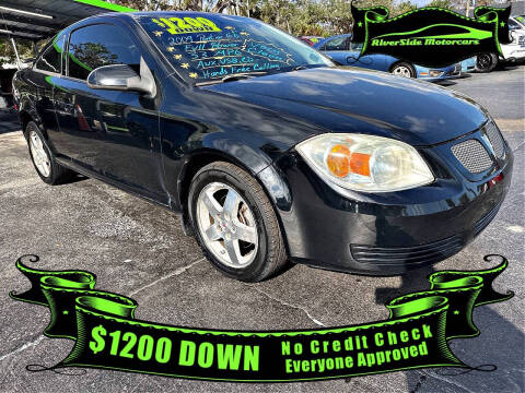 2009 Pontiac G5 for sale at RIVERSIDE MOTORCARS INC in New Smyrna Beach FL