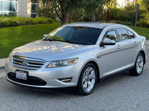 2012 Ford Taurus for sale at MILLENNIUM MOTORS in Van Nuys CA