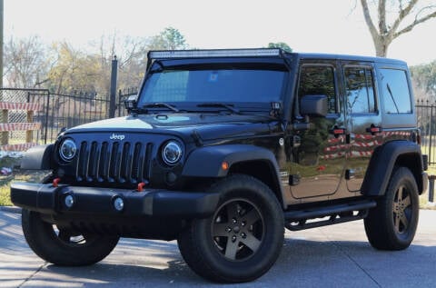 2014 Jeep Wrangler Unlimited for sale at Texas Auto Corporation in Houston TX
