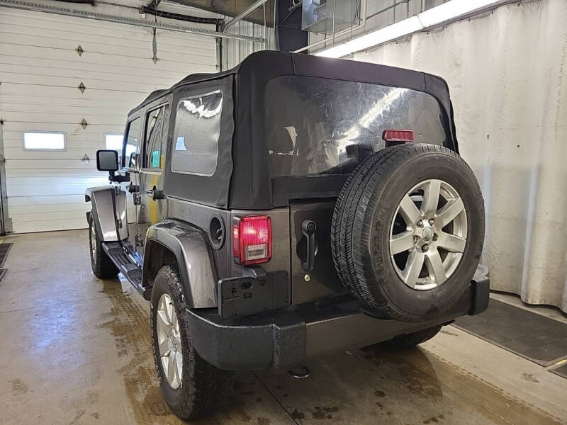 Used 2017 Jeep Wrangler Unlimited Sahara with VIN 1C4HJWEG5HL559689 for sale in Rockford, IL