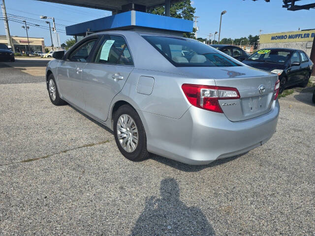 2012 Toyota Camry for sale at QUEENSGATE AUTO SALES in York, PA