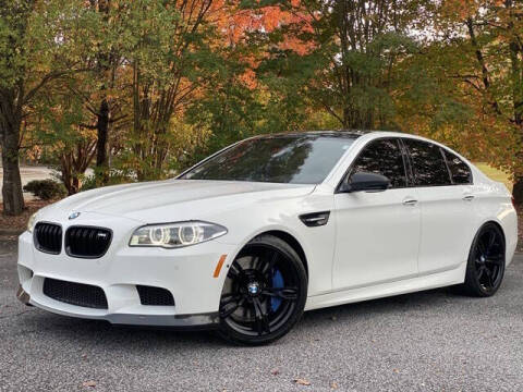 2014 BMW M5 for sale at Uniworld Auto Sales LLC. in Greensboro NC