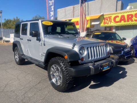 2012 Jeep Wrangler Unlimited for sale at Speciality Auto Sales in Oakdale CA
