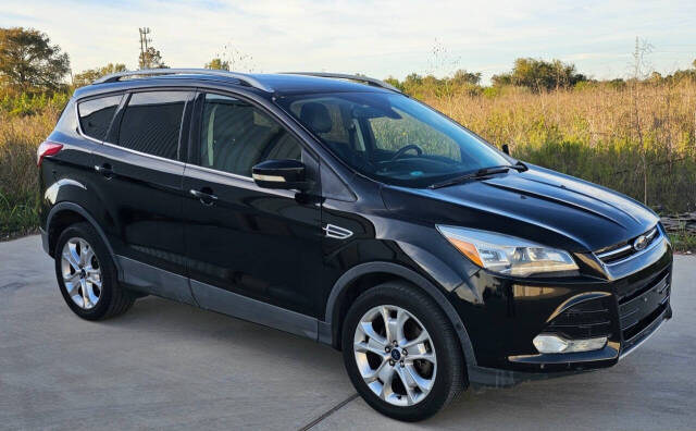 2016 Ford Escape for sale at CAR MARKET AUTO GROUP in Sugar Land, TX