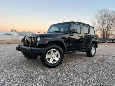 2014 Jeep Wrangler Unlimited for sale at Carworx LLC in Dunn NC