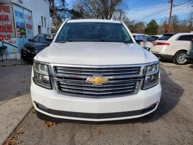 2015 Chevrolet Suburban for sale at DAGO'S AUTO SALES LLC in Dalton, GA