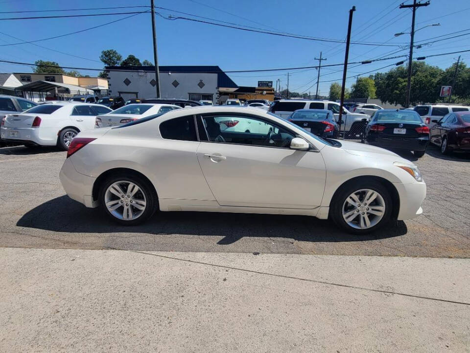 2012 Nissan Altima for sale at DAGO'S AUTO SALES LLC in Dalton, GA