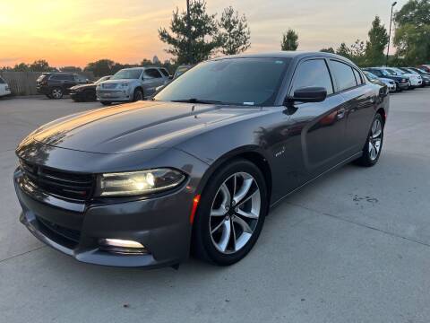 2015 Dodge Charger for sale at Azteca Auto Sales LLC in Des Moines IA