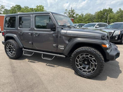 2021 Jeep Wrangler Unlimited for sale at HUFF AUTO GROUP in Jackson MI