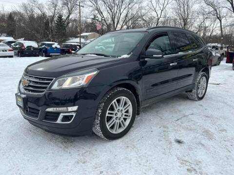 2014 Chevrolet Traverse for sale at Chinos Auto Sales in Crystal MN