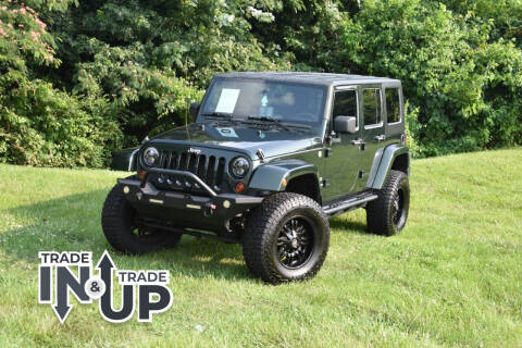 2010 Jeep Wrangler Unlimited for sale at Alpha Motors in Knoxville TN