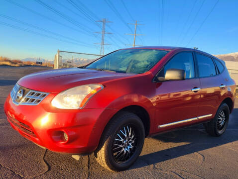 2011 Nissan Rogue for sale at BELOW BOOK AUTO SALES in Idaho Falls ID