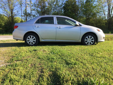 2010 Toyota Corolla for sale at Tennessee Valley Wholesale Autos LLC in Huntsville AL
