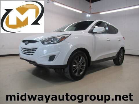 2014 Hyundai Tucson for sale at Midway Auto Group in Addison TX