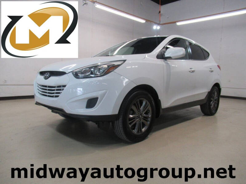 2014 Hyundai Tucson for sale at Midway Auto Group in Addison TX