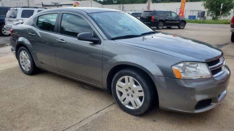 2013 Dodge Avenger for sale at SAVORS AUTO CONNECTION LLC in East Liverpool OH