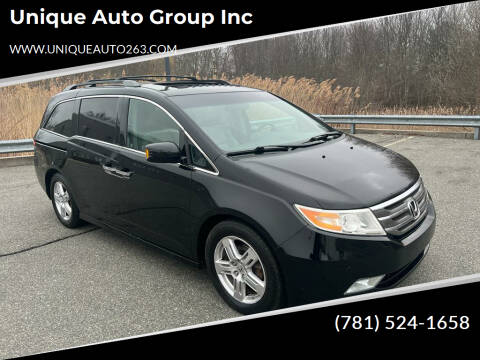 2012 Honda Odyssey for sale at Unique Auto Group Inc in Whitman MA