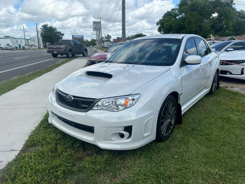 2013 Subaru Impreza for sale at P J Auto Trading Inc in Orlando FL