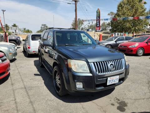 2009 Mercury Mariner for sale at E and M Auto Sales in Bloomington CA