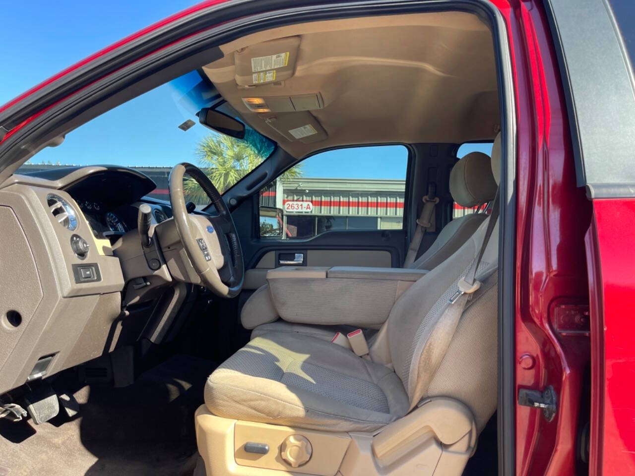 2014 Ford F-150 for sale at SMART CHOICE AUTO in Pasadena, TX