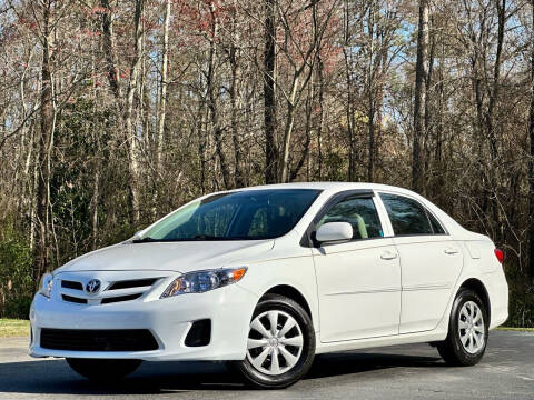 2013 Toyota Corolla for sale at Sebar Inc. in Greensboro NC