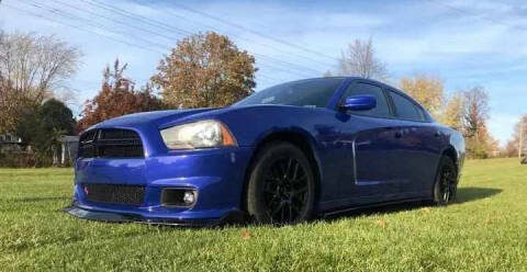 2013 Dodge Charger for sale at Revolution Auto Inc in McHenry IL