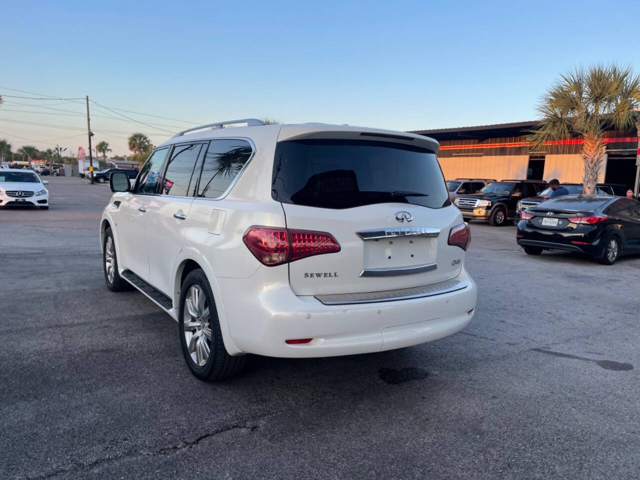 2014 INFINITI QX80 for sale at SMART CHOICE AUTO in Pasadena, TX