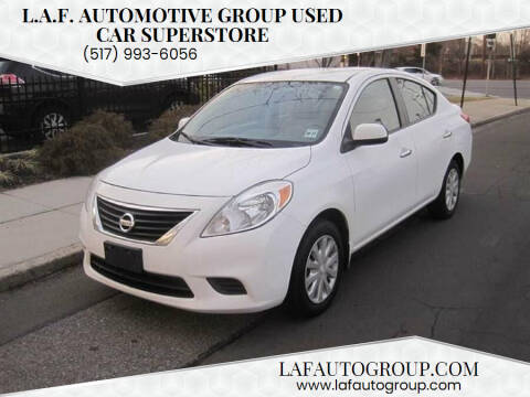 2012 Nissan Versa for sale at L.A.F. Automotive Group Used Car Superstore in Lansing MI