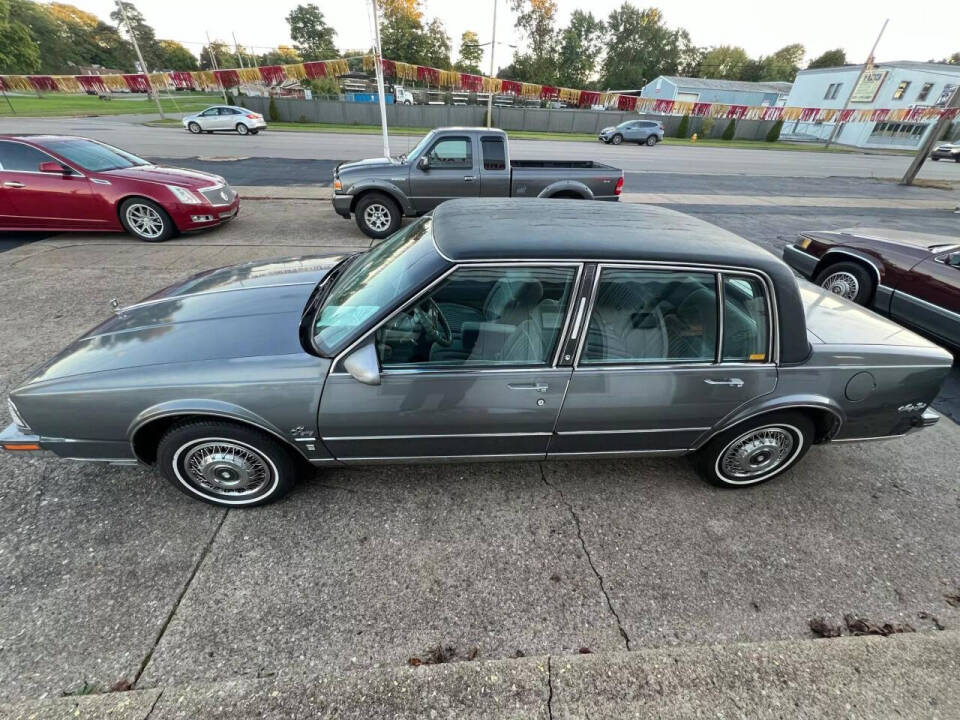 1988 Oldsmobile Ninety-Eight for sale at RT Barrett Auto Group in Austintown, OH