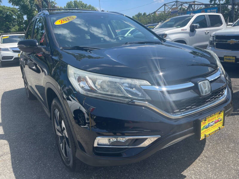 Used 2015 Honda CR-V Touring with VIN 5J6RM4H96FL027534 for sale in Passaic, NJ