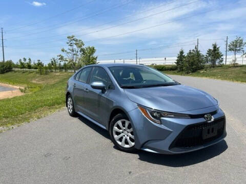2021 Toyota Corolla for sale at BOOST MOTORS LLC in Sterling VA