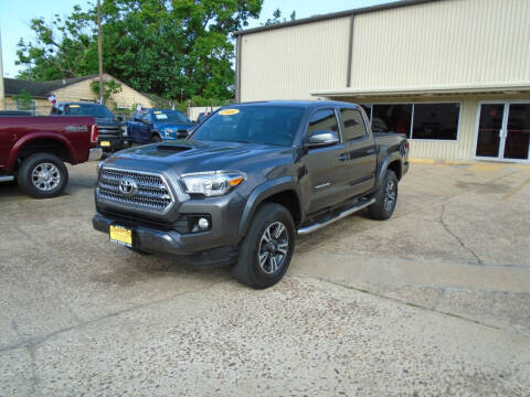 2016 Toyota Tacoma for sale at Campos Trucks & SUVs, Inc. in Houston TX