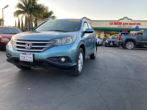 2014 Honda CR-V for sale at La Mesa Auto Sales in Huntington Park CA