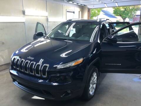 2014 Jeep Cherokee for sale at MADDEN MOTORS INC in Peru IN