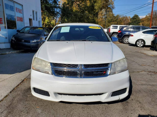 2013 Dodge Avenger for sale at DAGO'S AUTO SALES LLC in Dalton, GA