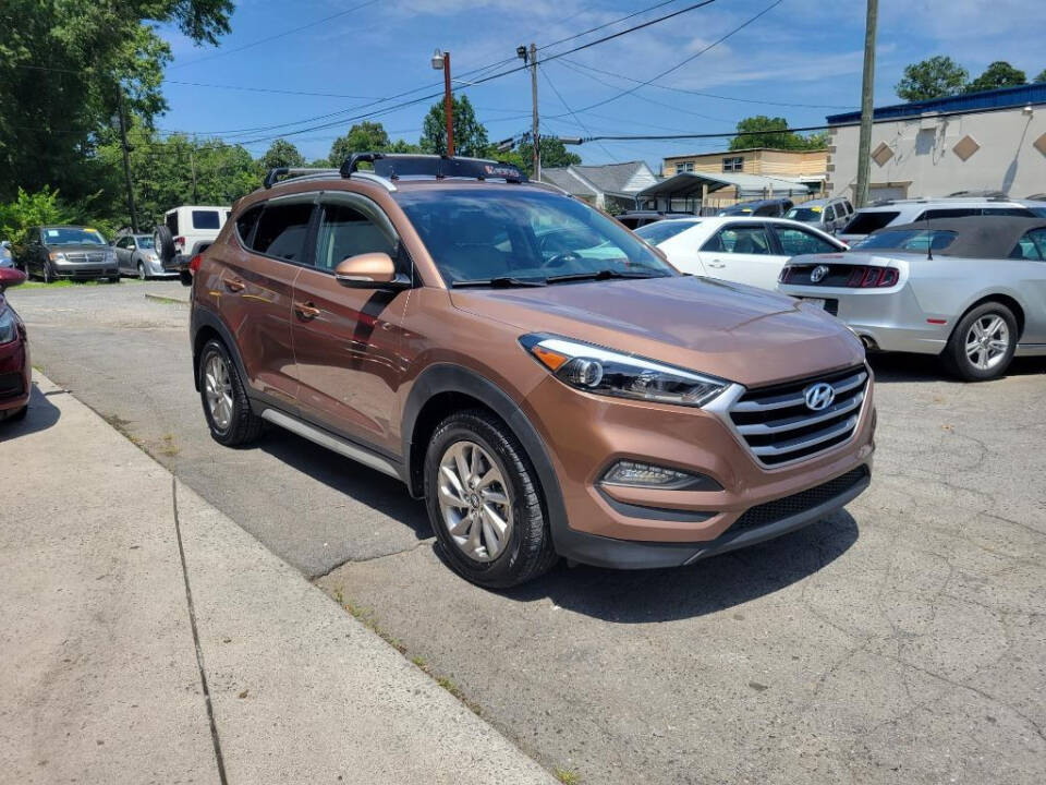 2017 Hyundai TUCSON for sale at DAGO'S AUTO SALES LLC in Dalton, GA