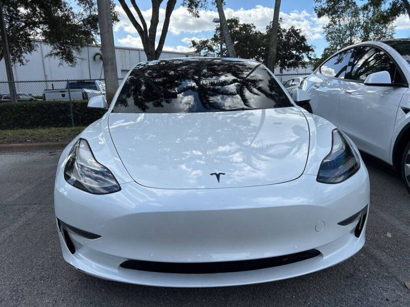 Used 2022 Tesla Model 3 Long Range with VIN 5YJ3E1EBXNF103028 for sale in Davie, FL