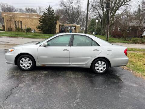 2002 Toyota Camry for sale at VINE STREET MOTOR CO in Urbana IL
