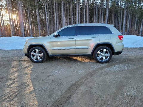 2011 Jeep Grand Cherokee for sale at McLain's Auto Sales in Lake City MI