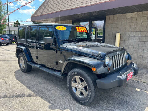 2013 Jeep Wrangler Unlimited for sale at West College Auto Sales in Menasha WI