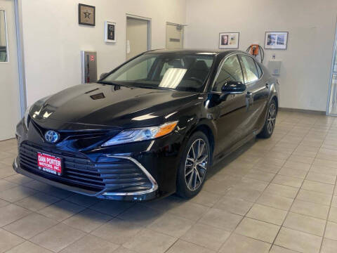 2022 Toyota Camry Hybrid for sale at DAN PORTER MOTORS in Dickinson ND