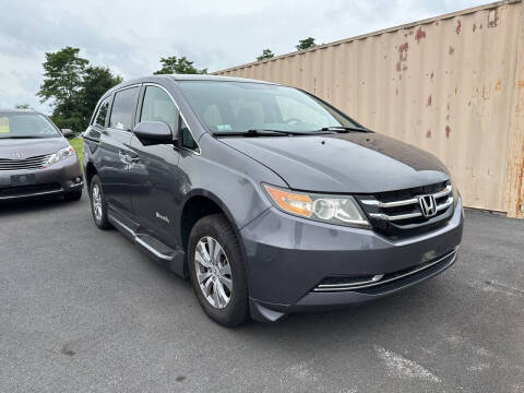 2016 Honda Odyssey for sale at Adaptive Mobility Wheelchair Vans in Seekonk MA