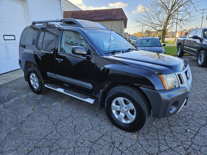2011 Nissan Xterra for sale at Van Kalker Motors in Grand Rapids MI