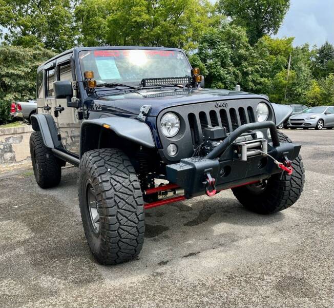 2013 Jeep Wrangler Unlimited for sale at Morristown Auto Sales in Morristown TN