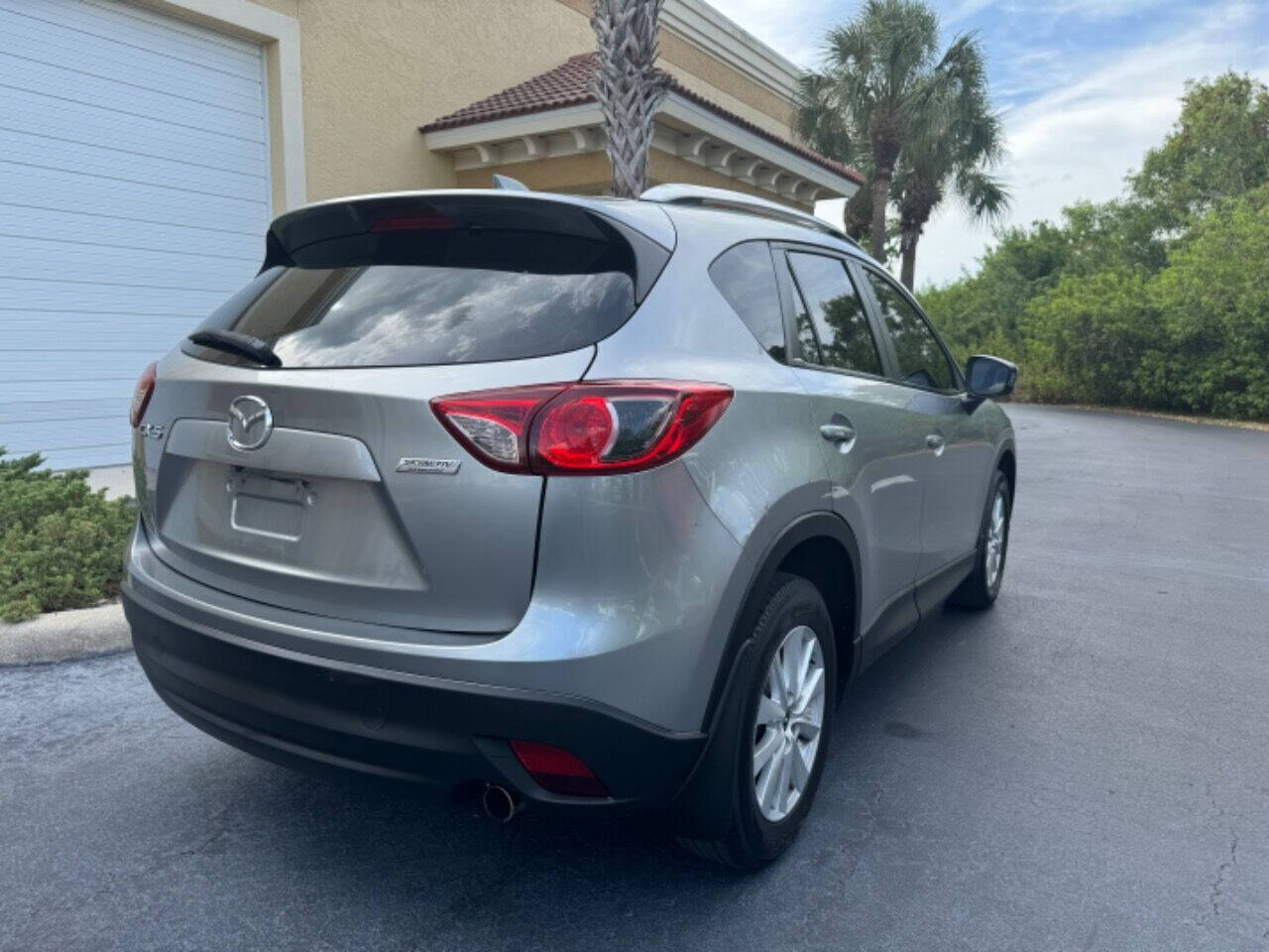 2013 Mazda CX-5 for sale at LP AUTO SALES in Naples, FL