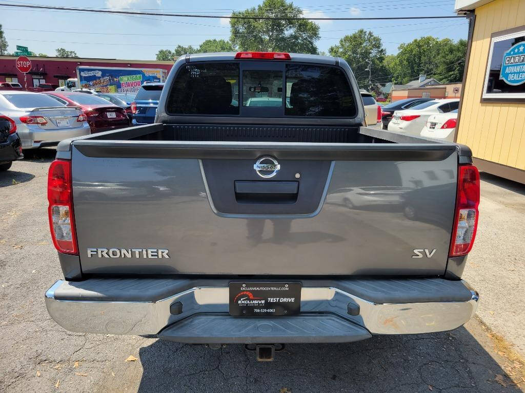 2016 Nissan Frontier for sale at DAGO'S AUTO SALES LLC in Dalton, GA