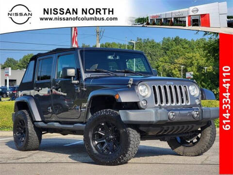 2017 Jeep Wrangler Unlimited for sale at Auto Center of Columbus in Columbus OH