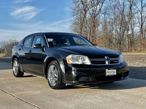 2014 Dodge Avenger for sale at First Auto Credit in Jackson MO