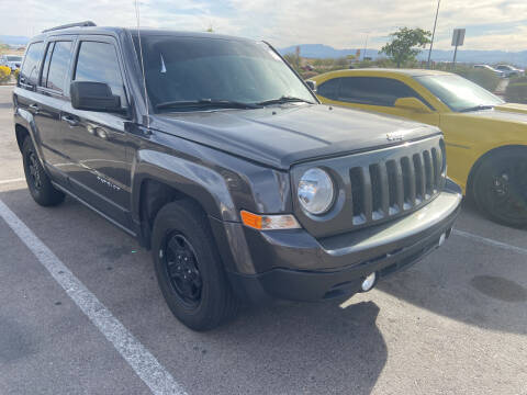2015 Jeep Patriot for sale at BELOW BOOK AUTO SALES in Idaho Falls ID